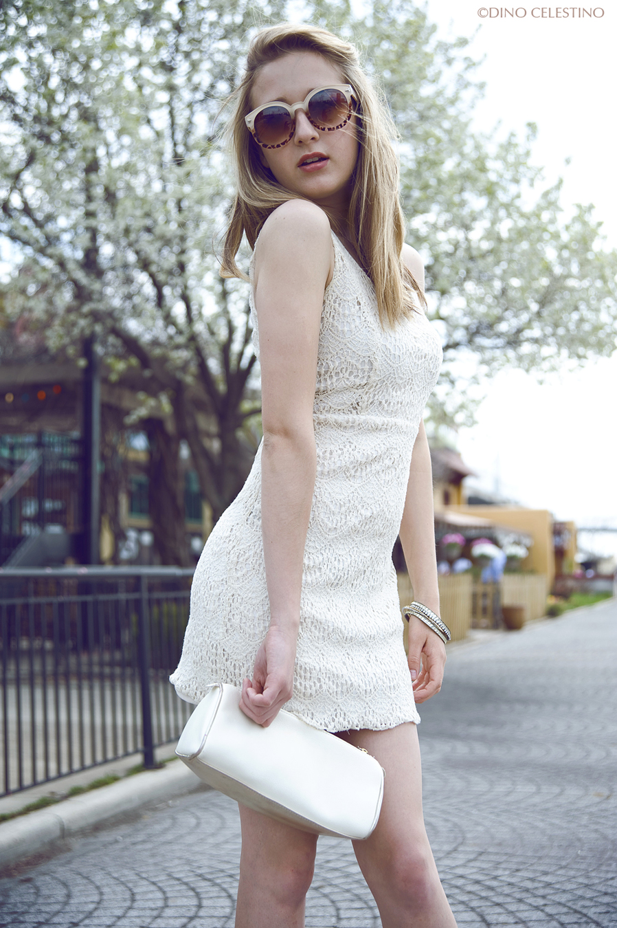 sam chambers in a white dress with dino celestino